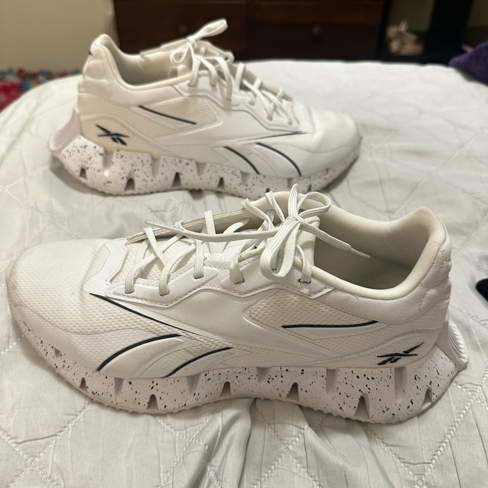 Reebok White Sneakers with Black Detailing